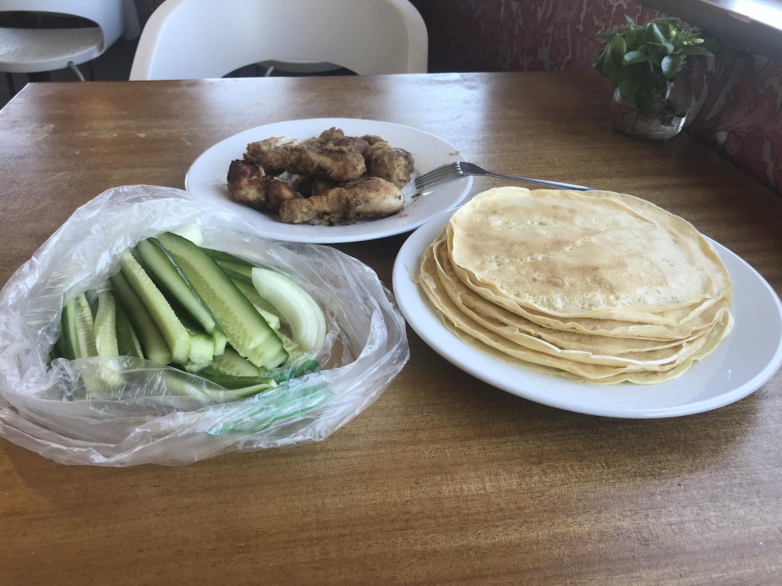 I had a lot of downtime in Wanaka, NZ due to my injured leg. I wanted something that reminded me of home and my parents used to make savory crepes with green onion/black bean sauce inside. Improvised a bit with what I had by frying some chicken and chopping some cucumber/onions and came up with these.