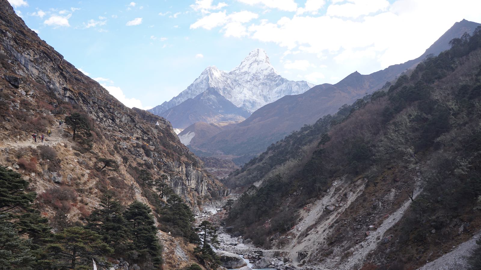 Got back down below the tree line, turned back at a river crossing for one more gorgeous look at the peak of Ama Dablam