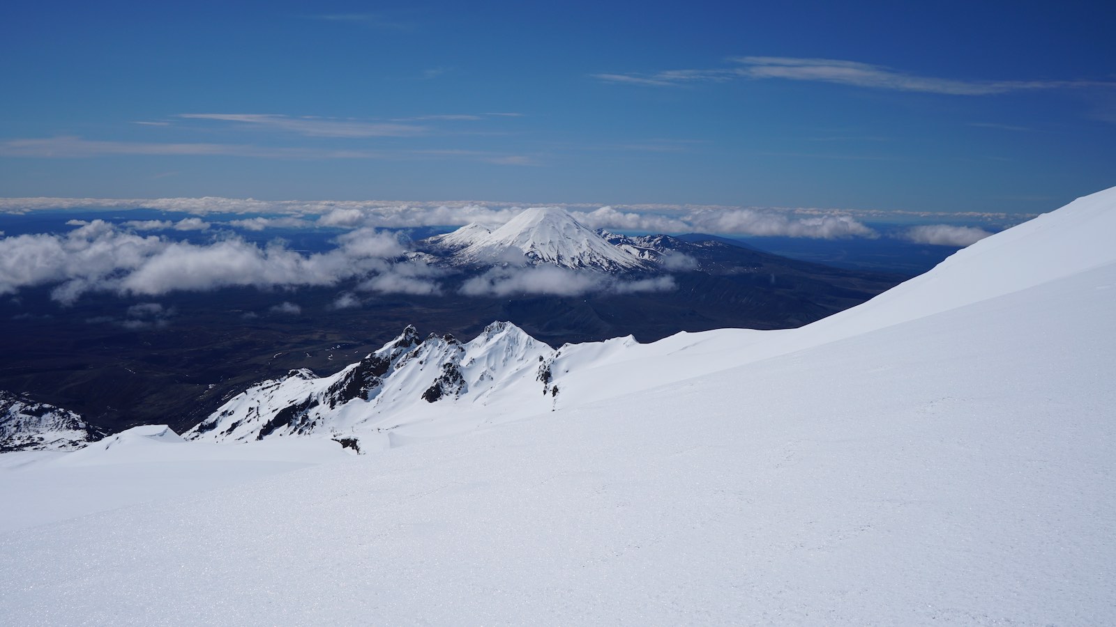 We took small 2 minute breaks every once in a while to catch our breath and take in the scenery, and the view behind us was nothing short of breathtaking. This is Mt. Ngauruhoe from the slopes of Ruapehu