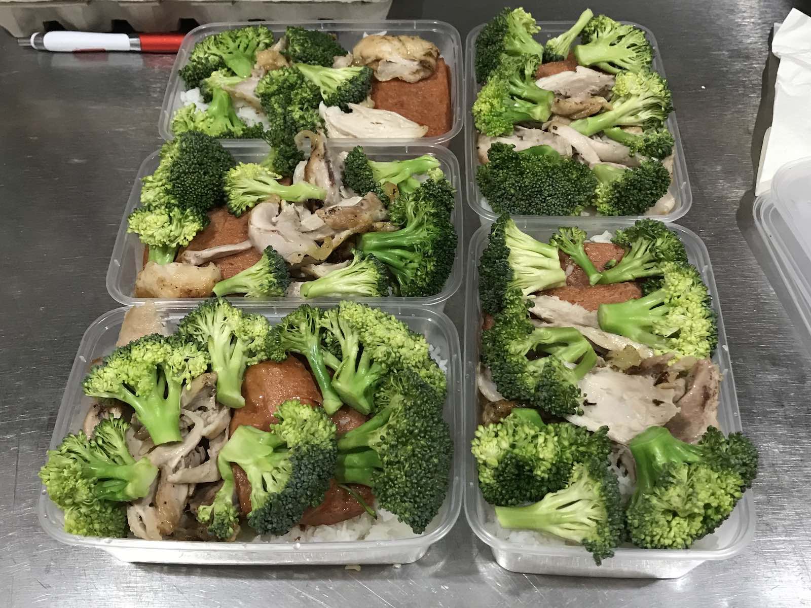 I used to meal prep a lot which saved me tons of money and it's about the same on the road. This works great when I'm staying in the same city for a couple days: rice chicken, spam and broccoli. I prepped this during my stay in Sydney, Australia.