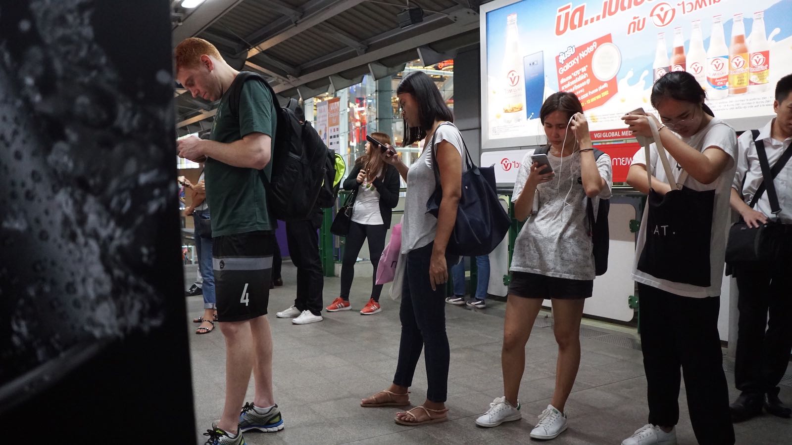 Ironically this was the line right in front of the "let's talk to each other" sign. Everyone on their phones.