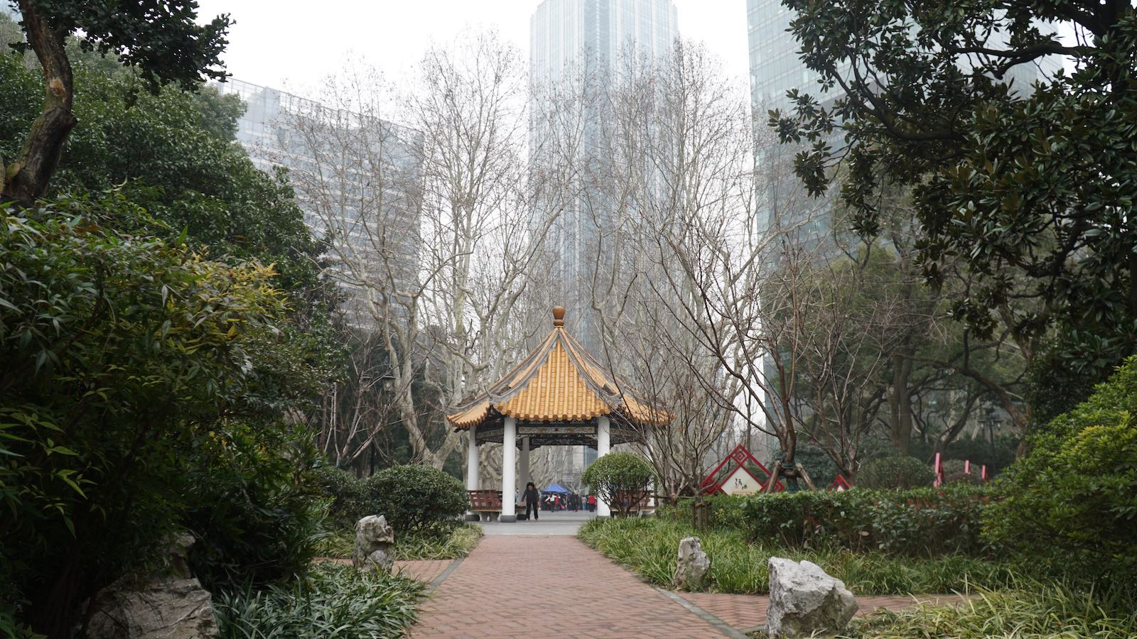 There was a tranquil garden area in the middle of what looked like a downtown financial center near where I was staying. I often walked around in there because it was a pleasant escape from the business of the cities. They had really pretty flowers sprinkled around too.