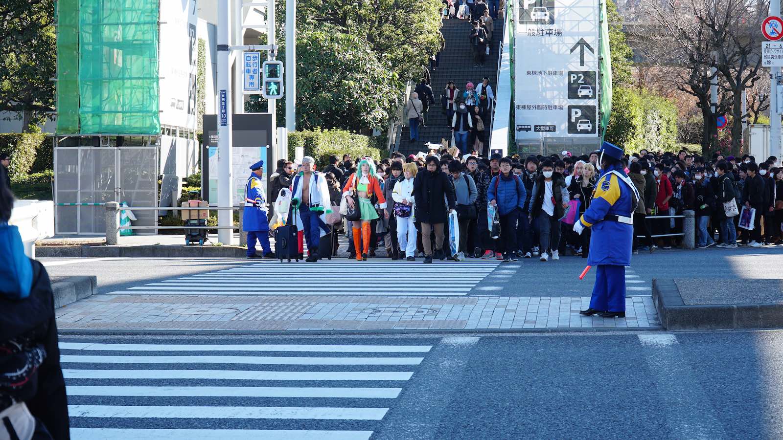 My last day in Tokyo was my most eventful. I went out to a huge manga convention that happened to be going on called Comiket, which my friend had told me about the day before. Even though I haven't read any manga, I figured it would be really cool to experience it. As I got near the convention, I realized the scale of this convention: every street crossing was overflowing with people cosplaying or with hands full of swag.